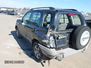 2003 Chevrolet Tracker with VIN 2CNBE13C736921273, listed as a IAAI auction lot 41453815 with 150,768 mi miles and . Bid and sale history available at DreamBid. Image 3.