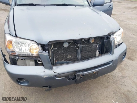 2006 Toyota Highlander Hybrid with VIN JTEEW21A260021072, listed as a IAAI auction lot 41903150 with 164,766 mi miles. Bid and sale history available at carsss.com. Image 6.