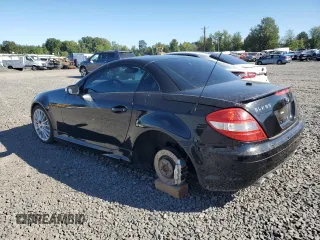 2007 Mercedes-Benz SLK-Class 5.5L AMG with VIN WDBWK73F67F150682, listed as a Copart auction lot 69413164 with 109,198 mi miles and Salvage Title. Bid and sale history available at carsss.com. Image 2.