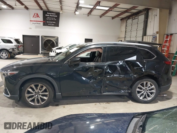 2016 Mazda CX-9 Signature z VIN JM3TCBEY5G0111286, wystawiony jako IAAI lot #42018161 z przebiegiem 155 920 mil mil oraz . Historia ofert i sprzedaży dostępna na DreamBid. Obrazek 14.