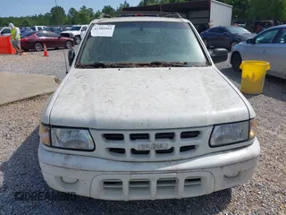 2002 Isuzu Rodeo S с VIN 4S2CK58W024313661, выставлен на аукционе IAAI как лот 42305564 с пробегом 174 949 миль миль и . История ставок и продаж доступна на DreamBid. Изображение 6.