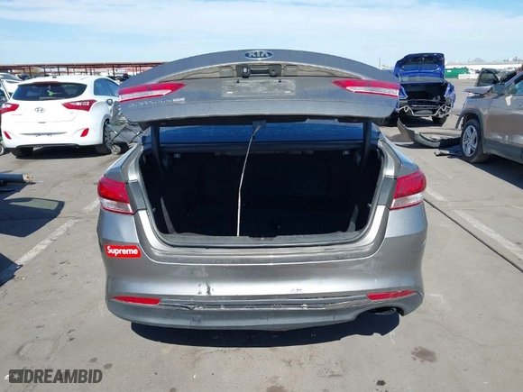 2017 Kia Optima LX with VIN 5XXGT4L30HG149506, listed as a IAAI auction lot 41591864 with 137,087 mi miles. Bid and sale history available at carsss.com. Image 16.
