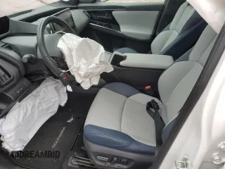 2023 Subaru Solterra Touring with VIN JTMABABA4PA003434, listed as a Copart auction lot 59837165 with 9,587 mi miles and Salvage title. Bid and sale history available at DreamBid. Image 7.