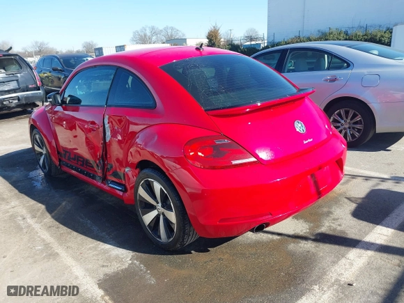 2012 Volkswagen Beetle 2.0T Turbo w/Sun/Sound with VIN 3VWV67ATXCM650376, listed as a IAAI auction lot 41315431 with 104,523 mi miles. Bid and sale history available at carsss.com. Image 3.
