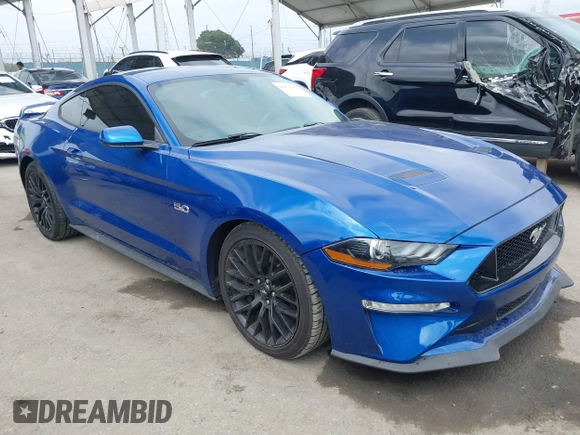 2018 Ford Mustang GT z VIN 1FA6P8CF2J5127010, wystawiony jako IAAI lot #42077900 z przebiegiem 77 023 mil mil oraz . Historia ofert i sprzedaży dostępna na DreamBid. Obrazek 1.