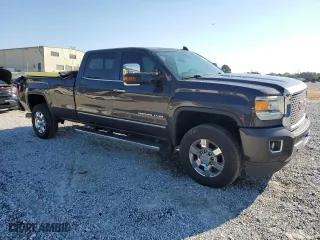 2015 GMC Sierra 3500HD Denali with VIN 1GT424E86FF533171, listed as a Copart auction lot 74837874 with 128,234 mi miles and Salvage Title. Bid and sale history available at carsss.com. Image 4.