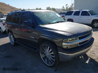 2003 Chevrolet Tahoe LT with VIN 1GNEC13T23R289916, listed as a IAAI auction lot 41408918 with 95,711 mi miles. Bid and sale history available at carsss.com. Image 1.