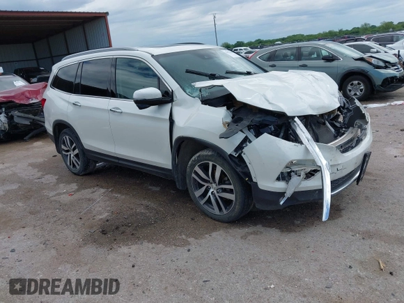 2017 Honda Pilot Touring with VIN 5FNYF6H9XHB034001, listed as a IAAI auction lot 42092549 with 142,422 mi miles and . Bid and sale history available at DreamBid. Image 1.