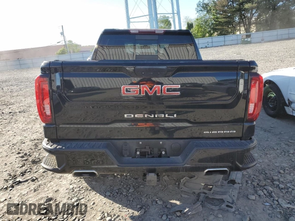 2022 GMC Sierra 1500 Denali with VIN 3GTU9FEDXNG209951, listed as a Copart auction lot 57488985 with 49,039 mi miles and Salvage title. Bid and sale history available at DreamBid. Image 6.