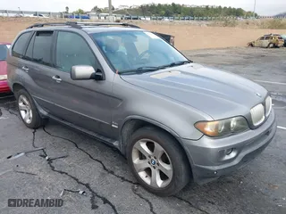 2006 BMW X5 4.4i with VIN 5UXFB535X6LV21628, listed as a IAAI auction lot 41512782 with 164,968 mi miles. Bid and sale history available at carsss.com. Image 1.