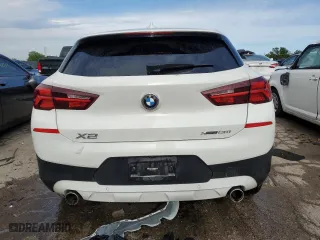 2021 BMW X2 xDrive28i with VIN WBXYJ1C08M5T00852, listed as a Copart auction lot 58498864 with 59,460 mi miles and Salvage Title. Bid and sale history available at carsss.com. Image 6.