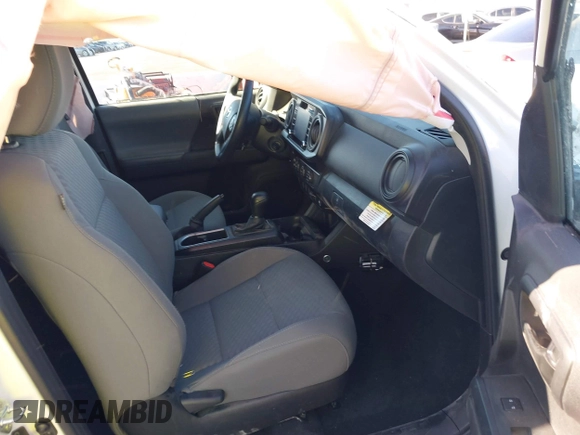 2022 Toyota Tacoma SR with VIN 3TYRX5GN6NT057748, listed as a IAAI auction lot 41238219 with 26,022 mi miles and . Bid and sale history available at DreamBid. Image 5.