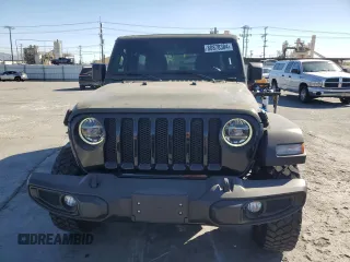 2021 Jeep Wrangler Unlimited Freedom z VIN 1C4HJXDG7MW576977, wystawiony jako Copart lot #80878384 z przebiegiem 19 793 mil mil oraz Szkoda całkowita • Salvage title. Historia ofert i sprzedaży dostępna na DreamBid. Obrazek 5.