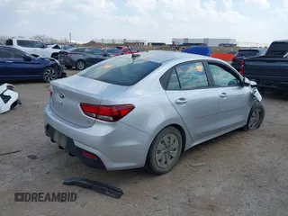 2020 Kia Rio LX with VIN 3KPA24AD5LE311944, listed as a IAAI auction lot 41877006 with 94,250 mi miles and . Bid and sale history available at DreamBid. Image 4.