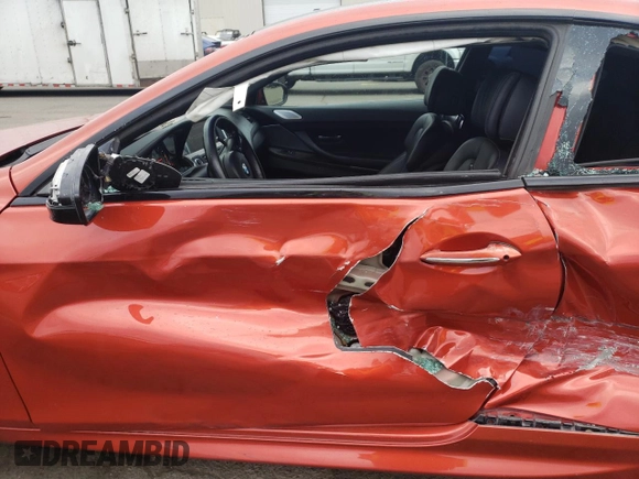 2014 BMW M6 z VIN WBSLX9C52ED160071, wystawiony jako Copart lot #77452554 z przebiegiem 64 814 mil mil oraz Szkoda całkowita • Salvage title. Historia ofert i sprzedaży dostępna na DreamBid. Obrazek 7.