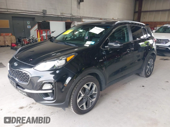2021 Kia Sportage EX z VIN KNDPNCAC5M7886551, wystawiony jako IAAI lot #42645206 z przebiegiem 49 312 mil mil oraz . Historia ofert i sprzedaży dostępna na DreamBid. Obrazek 18.