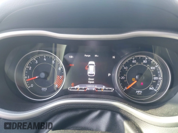 2015 Jeep Cherokee Trailhawk with VIN 1C4PJMBS3FW510219, listed as a IAAI auction lot 41440297 with 144,012 mi miles and . Bid and sale history available at DreamBid. Image 13.