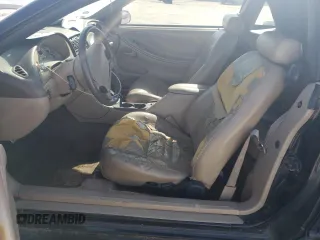 1999 Ford Mustang GT z VIN 1FAFP45X5XF224042, wystawiony jako Copart lot #52966565 z przebiegiem 145 862 mil mil oraz Szkoda całkowita • Salvage title. Historia ofert i sprzedaży dostępna na DreamBid. Obrazek 7.