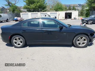 2015 Dodge Charger SE with VIN 2C3CDXBG9FH790573, listed as a IAAI auction lot 42142908 with 195,182 mi miles and . Bid and sale history available at carsss.com. Image 14.