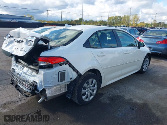 2023 Toyota Corolla Hybrid LE with VIN JTDBCMFEXP3017214, listed as a IAAI auction lot 40590468 with 9,428 mi miles and . Bid and sale history available at carsss.com. Image 4.