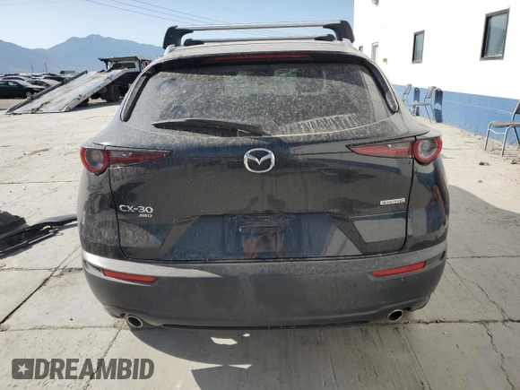 2023 Mazda CX-30 S Carbon Edition with VIN 3MVDMBCM6PM504431, listed as a Copart auction lot 61154795 with 90,396 mi miles and Salvage title. Bid and sale history available at DreamBid. Image 6.