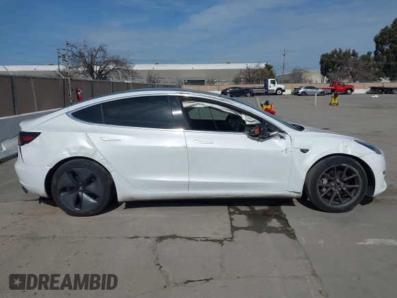 2018 Tesla Model 3 Long Range Battery with VIN 5YJ3E1EB7JF108519, listed as a IAAI auction lot 41835266 with 120,662 mi miles and . Bid and sale history available at DreamBid. Image 13.