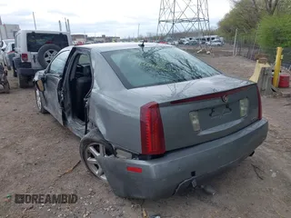2006 Cadillac STS z VIN 1G6DW677860129248, wystawiony jako IAAI lot #42042675 z przebiegiem 152 956 mil mil oraz . Historia ofert i sprzedaży dostępna na DreamBid. Obrazek 3.