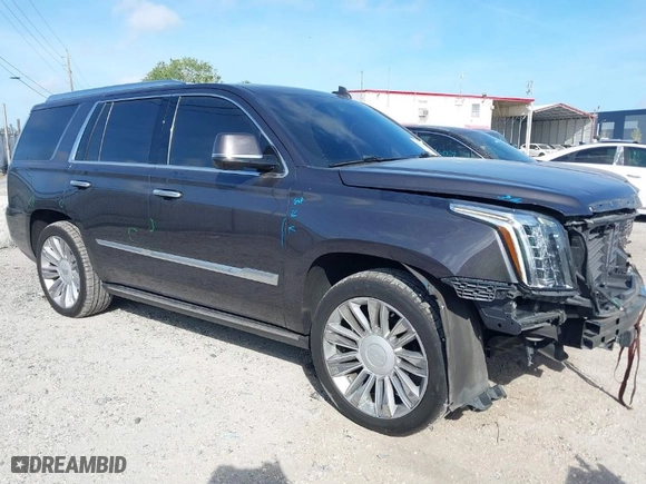 2017 Cadillac Escalade Premium Luxury with VIN 1GYS4CKJ5HR293450, listed as a IAAI auction lot 41951478 with 51,882 mi miles. Bid and sale history available at carsss.com. Image 1.