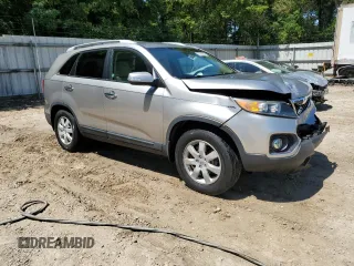 2013 Kia Sorento LX with VIN 5XYKT3A61DG372659, listed as a Copart auction lot 57787855 with 61,489 mi miles and Salvage title. Bid and sale history available at DreamBid. Image 4.