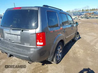 2010 Honda Pilot Touring with VIN 5FNYF4H93AB008589, listed as a IAAI auction lot 41731084 with 138,554 mi miles and . Bid and sale history available at carsss.com. Image 4.