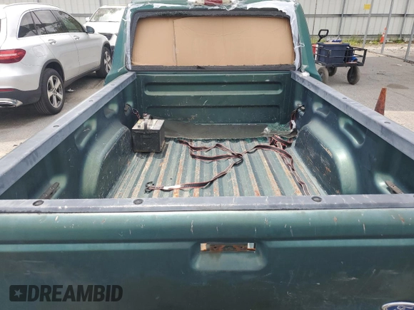 1999 Ford Ranger XL with VIN 1FTYR10C4XTA40745, listed as a Copart auction lot 52181525 with 185,096 mi miles and Salvage Title. Bid and sale history available at carsss.com. Image 10.