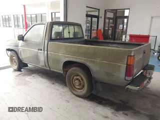 1988 Nissan Hardbody z VIN 1N6ND11S7JC388518, wystawiony jako IAAI lot #41839764 z przebiegiem 72 926 mil mil oraz . Historia ofert i sprzedaży dostępna na DreamBid. Obrazek 3.