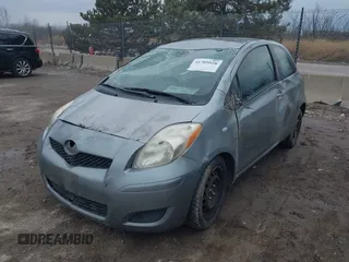 2011 Toyota Yaris with VIN JTDJT4K32B5325815, listed as a IAAI auction lot 41705028 with 137,509 mi miles. Bid and sale history available at carsss.com. Image 2.
