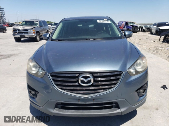 2016 Mazda CX-5 Touring with VIN JM3KE2CY3G0635643, listed as a Copart auction lot 52949105 with 179,464 mi miles and Clean Title. Bid and sale history available at carsss.com. Image 5.