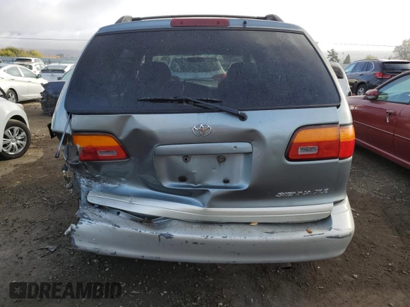 2000 Toyota Sienna LE with VIN 4T3ZF13C4YU209928, listed as a Copart auction lot 78900624 with 191,979 mi miles and Salvage Title. Bid and sale history available at carsss.com. Image 6.