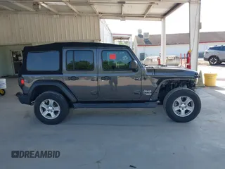 2020 Jeep Wrangler Unlimited Sport S with VIN 1C4HJXDN9LW167442, listed as a IAAI auction lot 42308617 with 59,335 mi miles and . Bid and sale history available at DreamBid. Image 14.