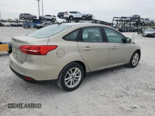 2016 Ford Focus SE z VIN 1FADP3F20GL267077, wystawiony jako Copart lot #53649665 z przebiegiem 106 329 mil mil oraz Szkoda całkowita • Salvage title. Historia ofert i sprzedaży dostępna na DreamBid. Obrazek 3.