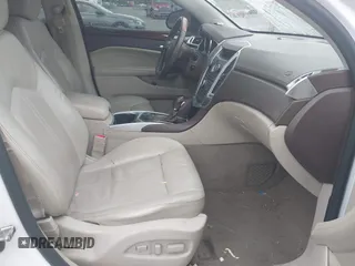 2011 Cadillac SRX Performance Collection with VIN 3GYFNBEY7BS585753, listed as a IAAI auction lot 42114525 with 233,329 mi miles and . Bid and sale history available at carsss.com. Image 5.