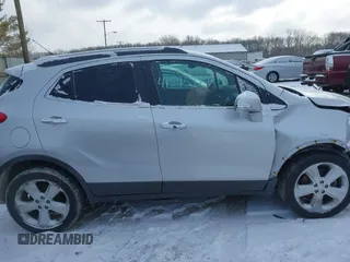 2015 Buick Encore with VIN KL4CJASB5FB257483, listed as a IAAI auction lot 41595174 with 91,826 mi miles. Bid and sale history available at carsss.com. Image 13.