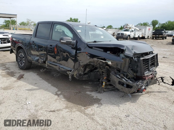 2021 Nissan Titan Pro-4X with VIN 1N6AA1ED0MN528002, listed as a Copart auction lot 54779885 with 33,235 mi miles and Salvage title. Bid and sale history available at DreamBid. Image 4.