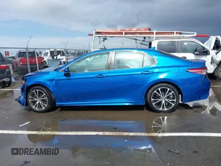 2019 Toyota Camry LE z VIN 4T1B11HK1KU282870, wystawiony jako IAAI lot #41799625 z przebiegiem 63 977 mil mil oraz . Historia ofert i sprzedaży dostępna na DreamBid. Obrazek 14.