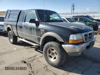 2000 Ford Ranger XLT with VIN 1FTZR15XXYTA37477, listed as a Copart auction lot 43273055 with 160,256 mi miles and Salvage Title. Bid and sale history available at carsss.com. Image 4.