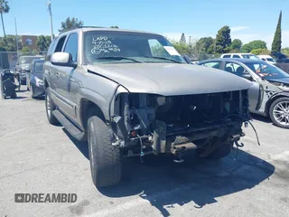 2002 GMC Yukon SLT with VIN 1GKEC13T62R202059, listed as a IAAI auction lot 42023547 with 1 mi miles. Bid and sale history available at carsss.com. Image 1.
