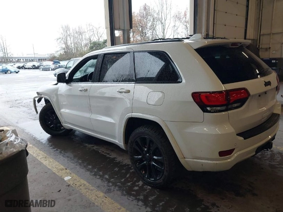 2019 Jeep Grand Cherokee Laredo E with VIN 1C4RJFAG1KC818289, listed as a IAAI auction lot 41602541 with 59,356 mi miles. Bid and sale history available at carsss.com. Image 3.
