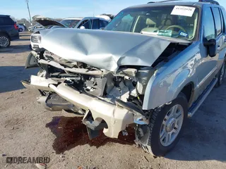 2005 Mercury Mountaineer Convenience with VIN 4M2DU66W15UJ08917, listed as a IAAI auction lot 41353920 with 80,362 mi miles. Bid and sale history available at carsss.com. Image 6.