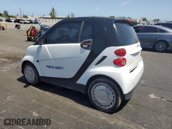 2014 Smart fortwo Pure with VIN WMEEJ3BAXEK778748, listed as a Copart auction lot 57611955 with 59,895 mi miles and Clean title. Bid and sale history available at DreamBid. Image 2.