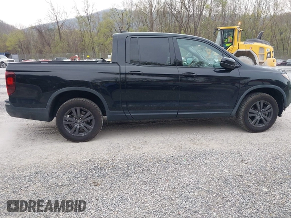 2019 Honda Ridgeline Sport with VIN 5FPYK3F10KB046552, listed as a IAAI auction lot 41983384 with 77,229 mi miles and . Bid and sale history available at DreamBid. Image 13.