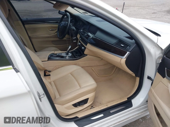 2013 BMW 5 Series 528i xDrive with VIN WBAXH5C5XDD106981, listed as a IAAI auction lot 42012477 with 140,259 mi miles. Bid and sale history available at carsss.com. Image 5.