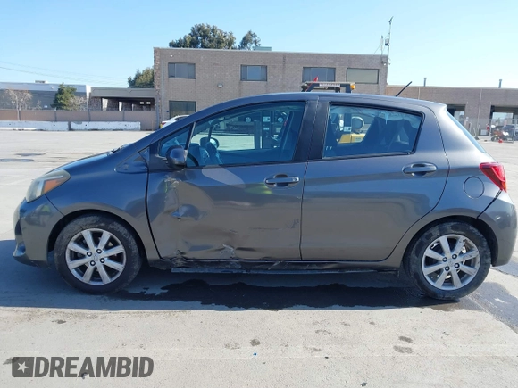 2015 Toyota Yaris L with VIN VNKKTUD3XFA022061, listed as a IAAI auction lot 41774318 with 134,082 mi miles. Bid and sale history available at carsss.com. Image 14.