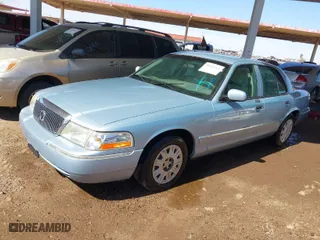 2004 Mercury Grand Marquis GS with VIN 2MEFM74W24X690149, listed as a IAAI auction lot 41842464 with 118,776 mi miles. Bid and sale history available at carsss.com. Image 2.